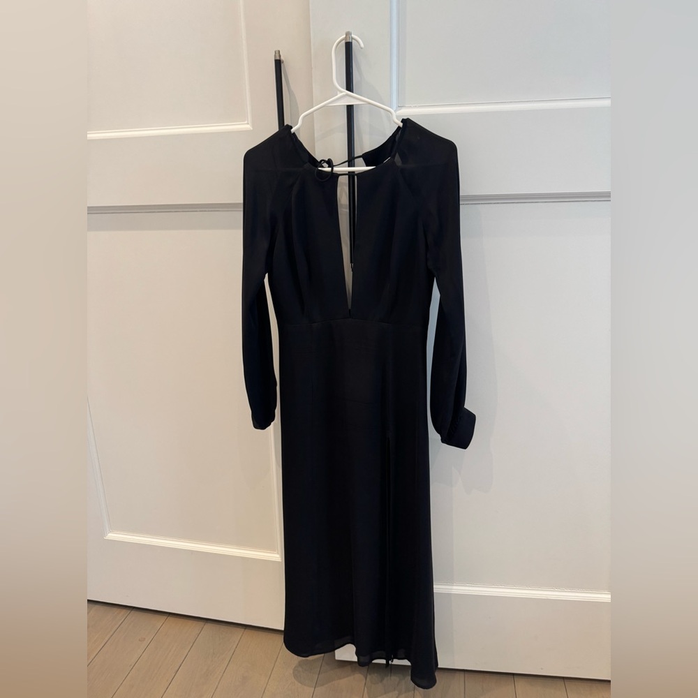 Stone Cold Fox dress, slit on leg, open/peek a boo front, cuffed wrist, stunning